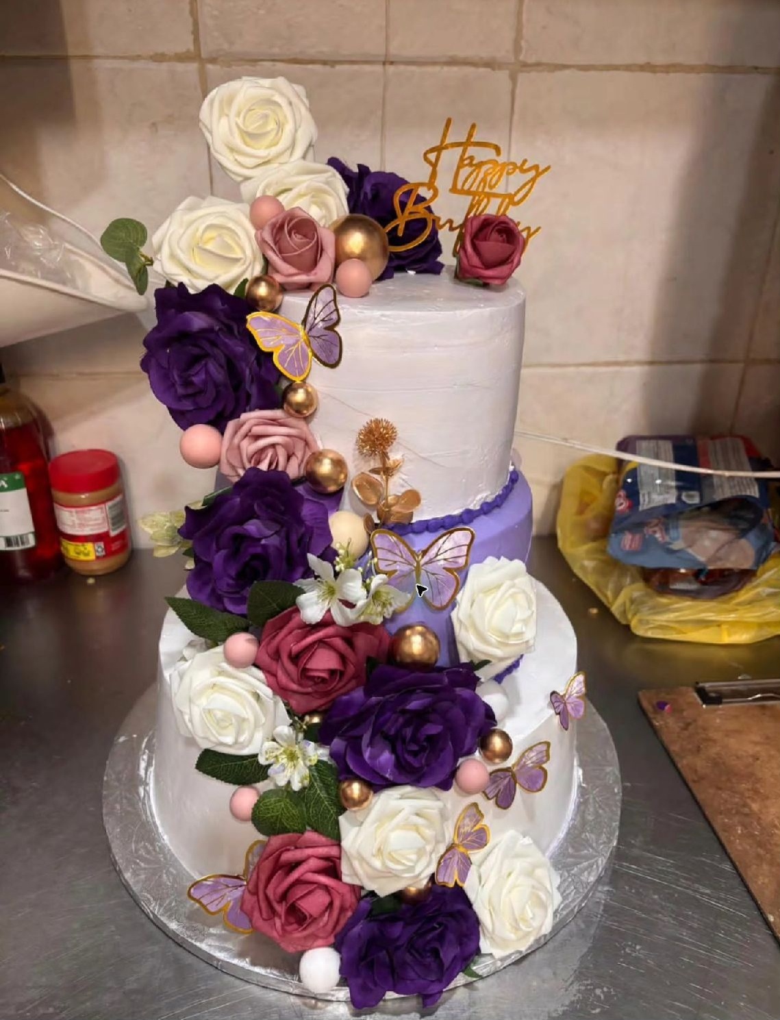 Purple floral tiered cake