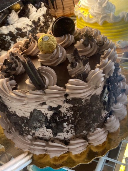 Chocolate cream cake with Oreo and Ferrero Rocher