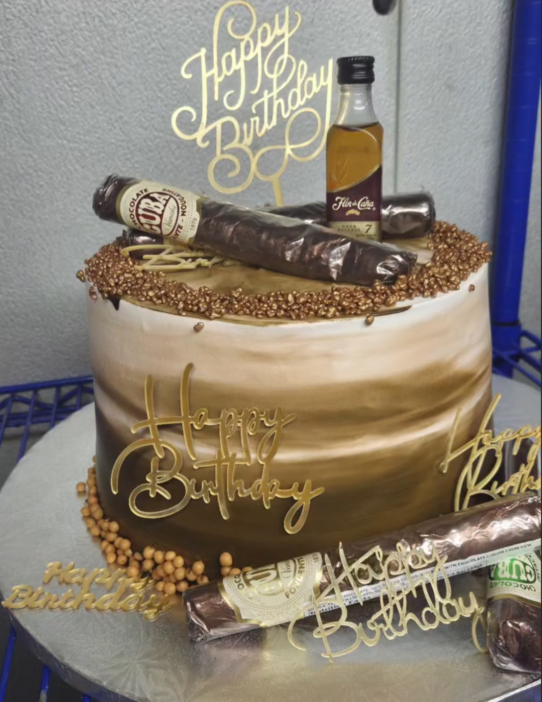 Gold and chocolate birthday cake